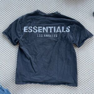 fear of god essentials black tee